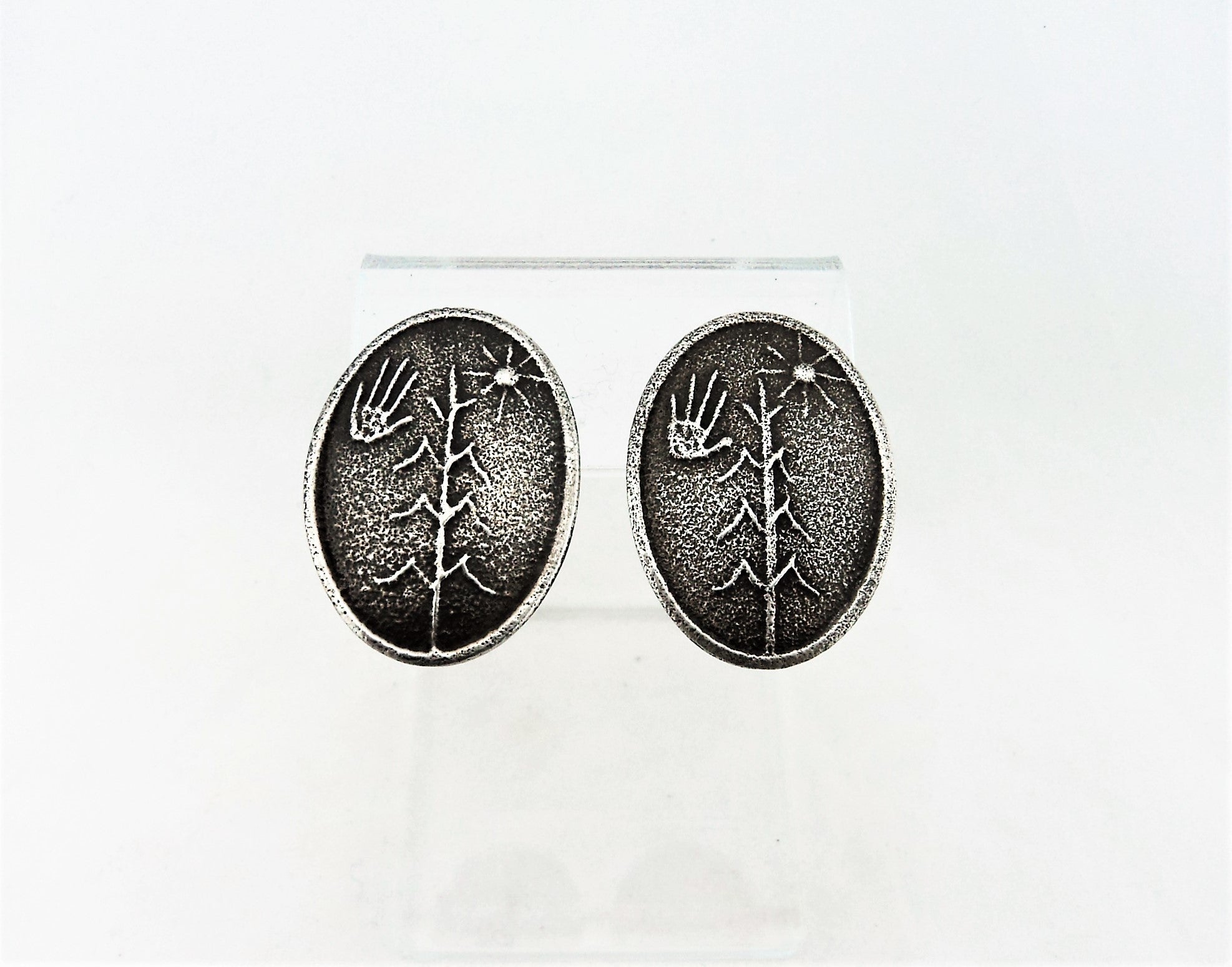 Santo Domingo Tufa Cast Sterling Silver Earrings by Cordell Lovato Pajarito