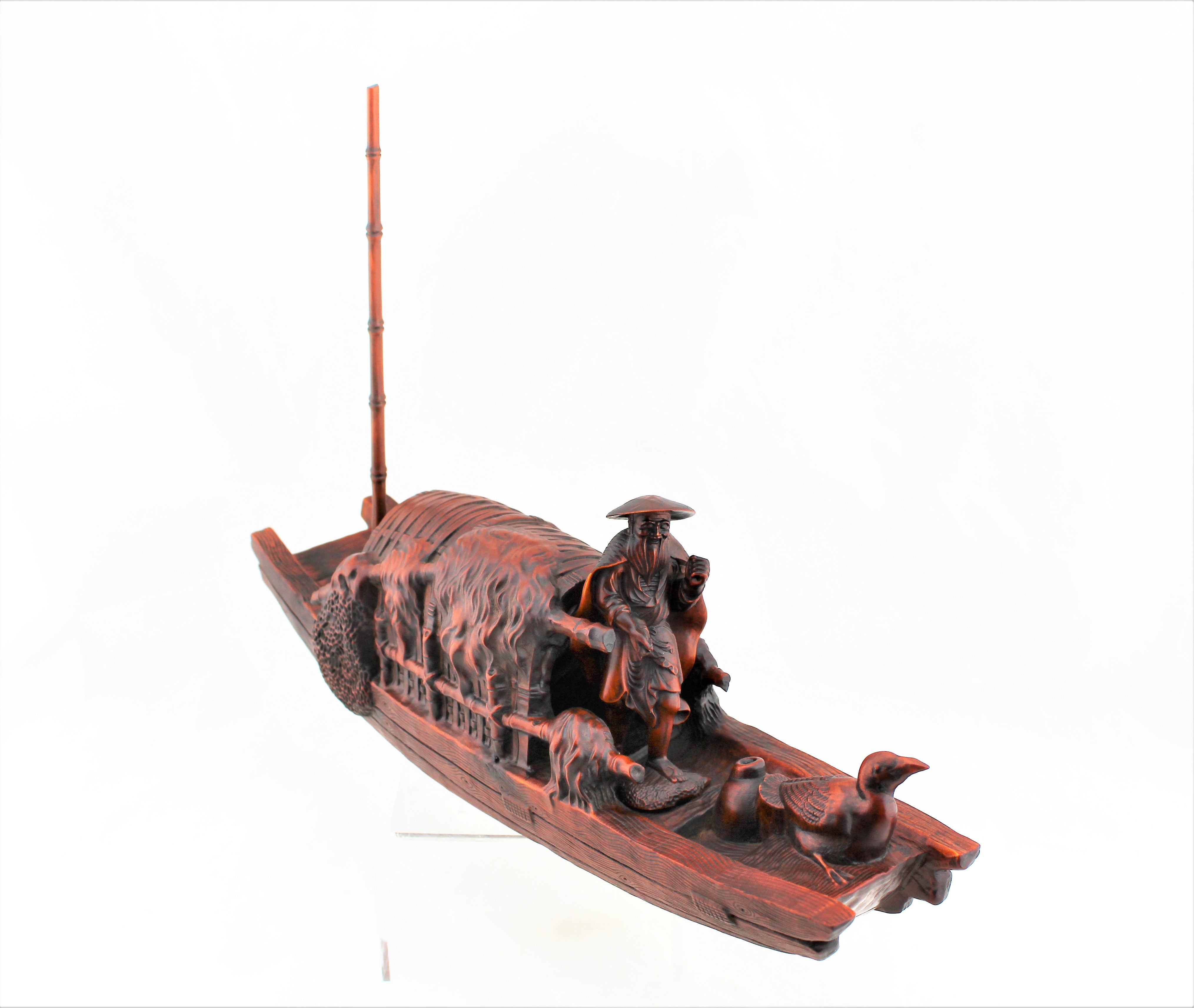 Boxwood Fisherman in a Boat