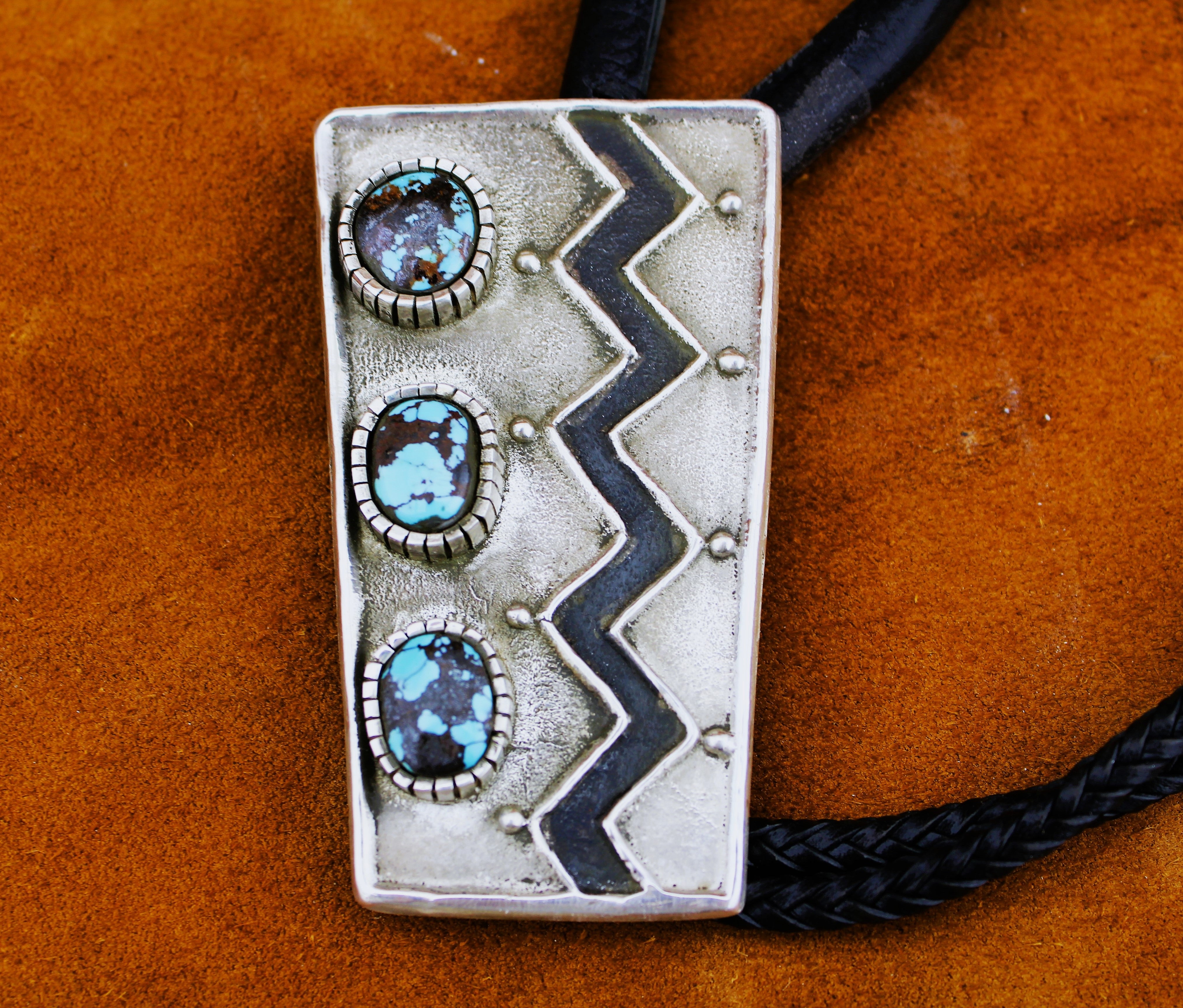 Merlin James Sterling Bolo Tie with Bisbee Turquoise