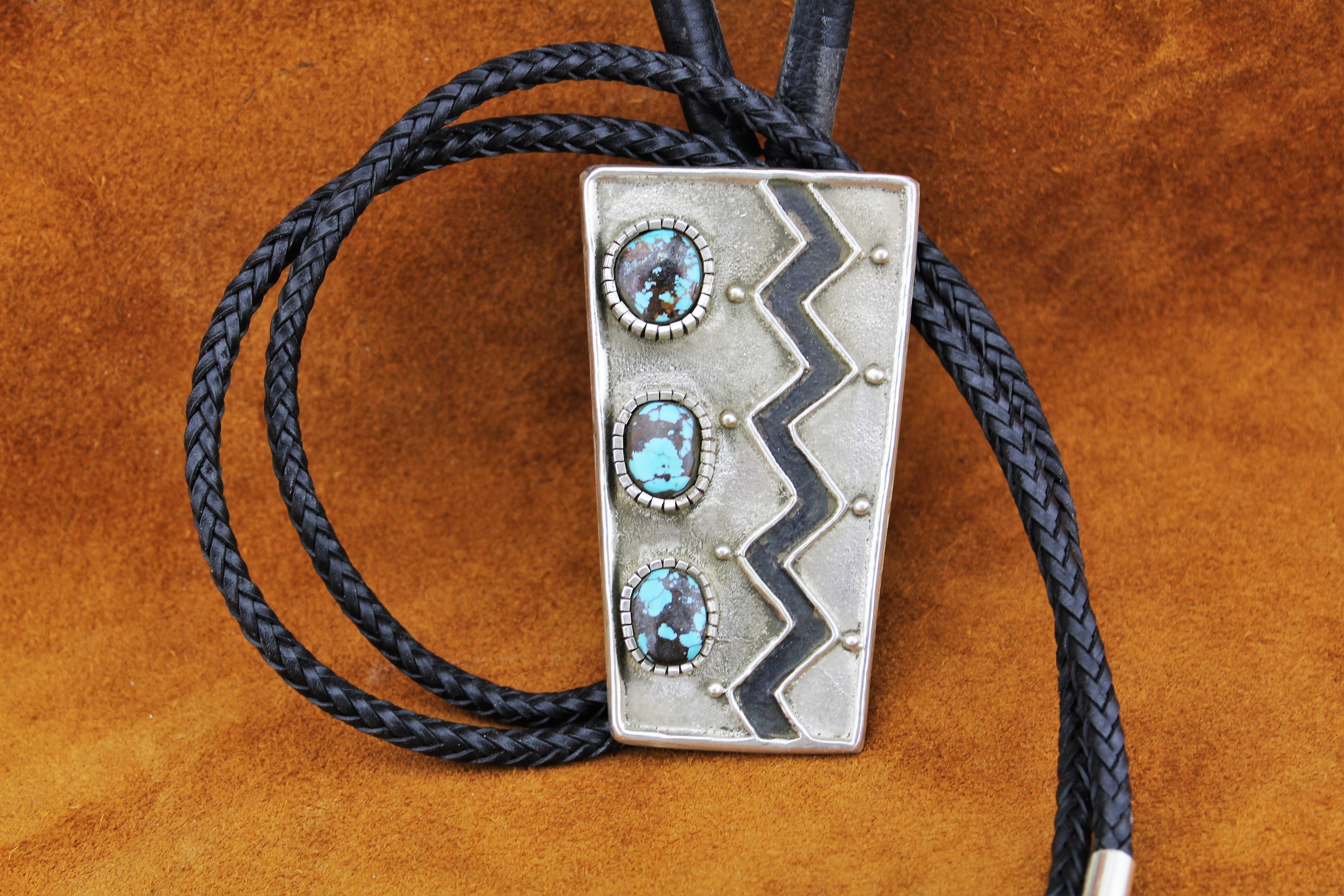 Merlin James Sterling Bolo Tie with Bisbee Turquoise